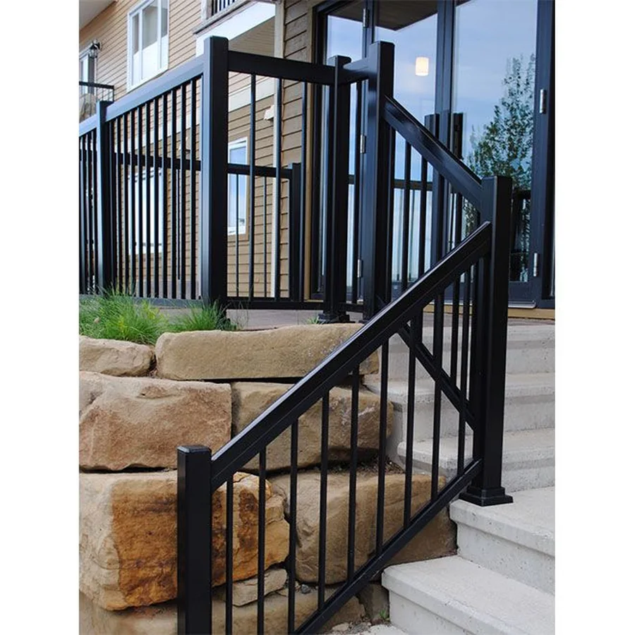 Black exterior stair railing beside stone steps